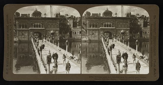 Entrance gate and causeway over the sacred tank, Golden Temple, Amritsar, India