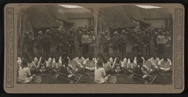 Sikhs singing religious chants outside their billets