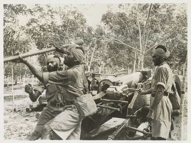 Sikh soldiers in training with field artillery in Singapore
