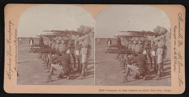 Company of Sikh soldiers at drill, Tien-Tsin, China.