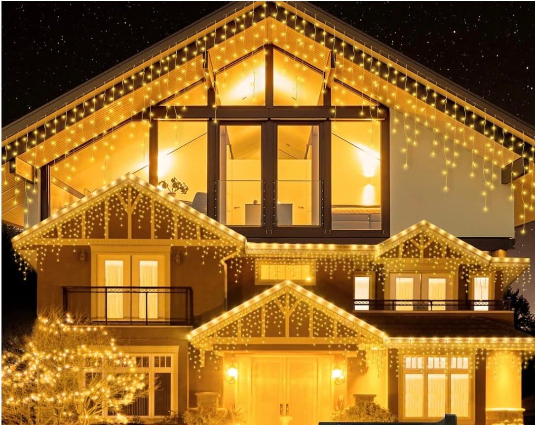 A home outlined in warm lights for Purab